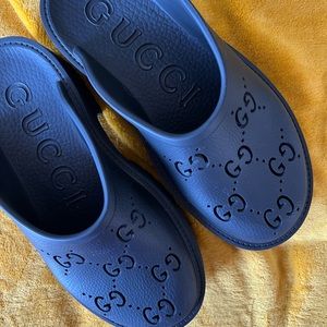 Gucci platform clogs